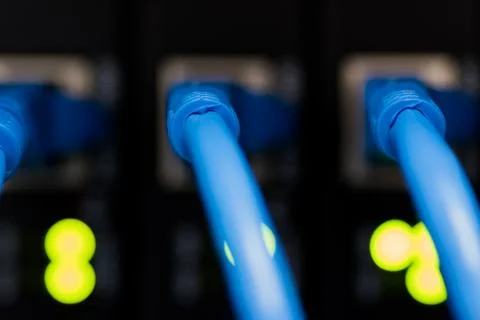 Network switch and Ethernet cables Stock Photos