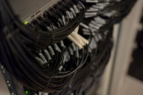 Network Switch and Ethernet Cables Patched into Local Network and IPTV Stock Photos