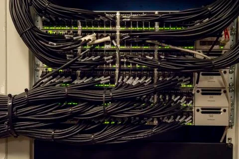 Network Switch and Ethernet Cables Patched into Local Network and IPTV Stock Photos