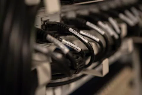 Network Switch and Ethernet Cables Patched into Local Network and IPTV Stock Photos