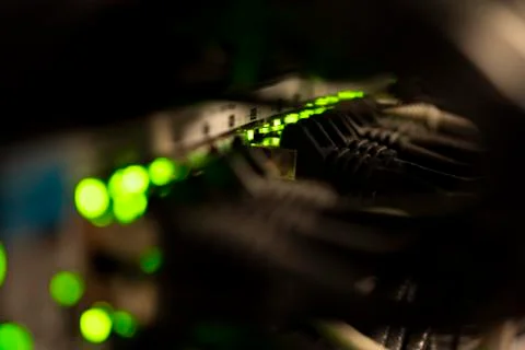 Network Switch and Ethernet Cables Patched into Local Network and IPTV Stock Photos