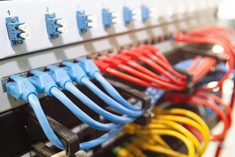 Network switch and UTP ethernet cable Stock Photos