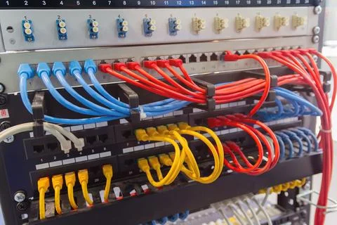 Network switch and UTP ethernet cables Stock Photos