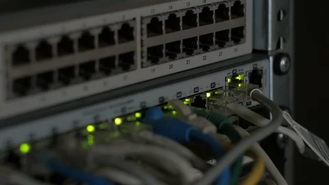 A network switch connected to the network transmits data Stock Footage