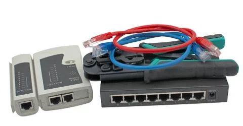 Network switch, ethernet cable and cable tester Stock Photos