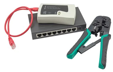 Network switch, ethernet cable, crimper and RJ45 cable tester Stock Photos