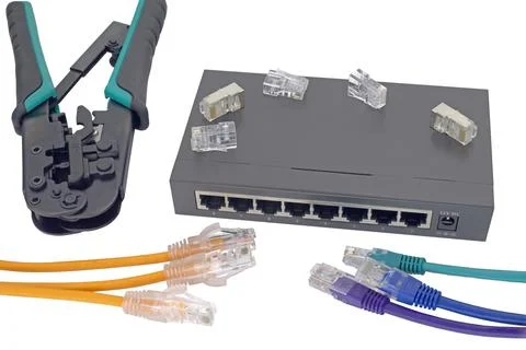 Network switch, ethernet cable, crimper isolated on white Foto stock