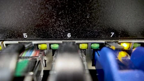 Network switch with ethernet cables and blinking lights Video stock 328151963