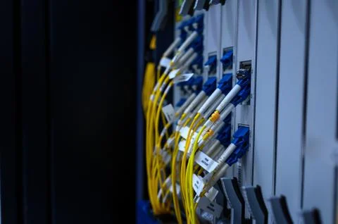 Network switch front panel with fiber optics patch cord connected Foto stock