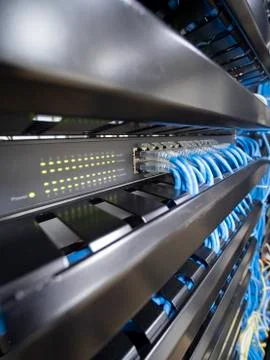 Network switch hub in rack cabinet. Network connection technology. Stock Photos