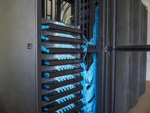 Network switch in rack cabinet Stock Photos