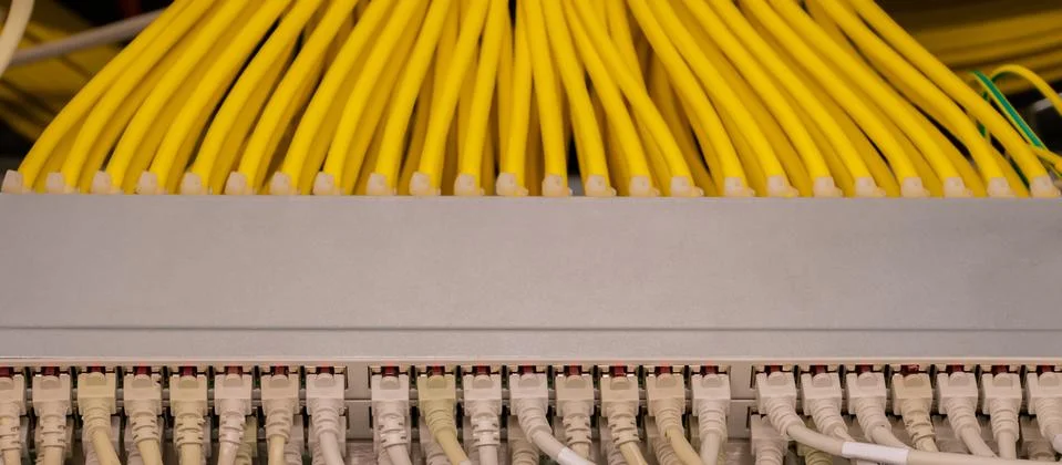 Network switch with RJ45 network cable in a data center Stock Photos