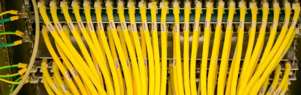 Network switch with RJ45 network cable in a data center Stock Photos