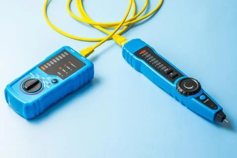 Network tester and patching cord Stock Photos