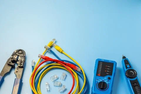 Network tester, patching cord, modular plug and network tool Stock Photos