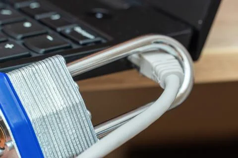 Network wire closed with metal lock close up Stock Photos