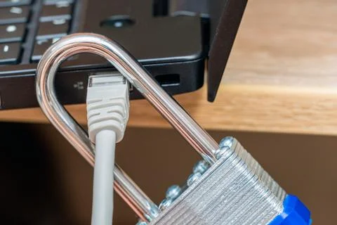Network wire closed with metal lock close up Stock Photos