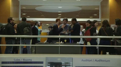 Networking and drinking coffee at a conference Stock Footage 64565930