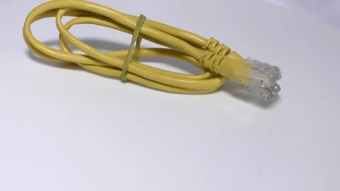 The networking cable of short length on white surface Stock Footage 111887726