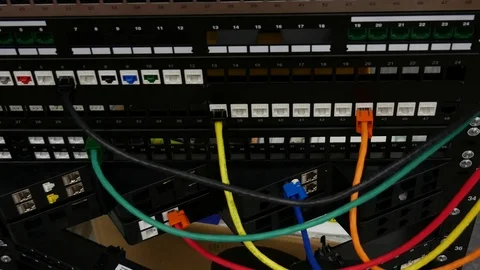 Networking device on rack cabinet and network administrator Stock Footage 90032474