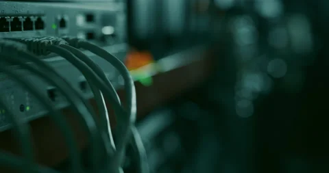 Networking hardware with attached RJ45 ethernet cables Stock Footage 131017306