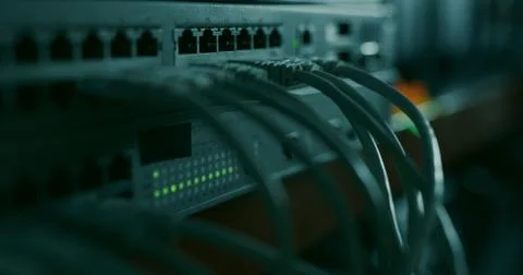 Networking hardware with attached RJ45 ethernet cables Stock Photos