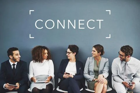 Networking before their interview. Studio shot of businesspeople talking while Stock Photos