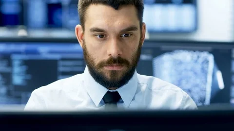 Neural Network and Machine Learning Engineer Working Hard at His Workstation.  Stock Footage 81268567