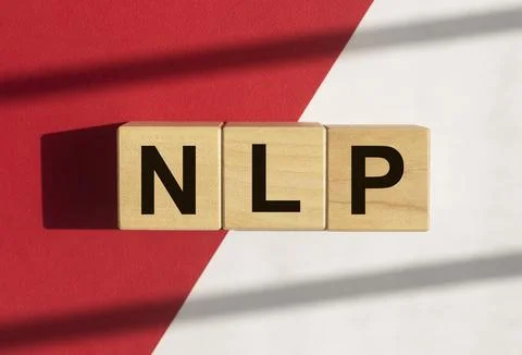 Neuro-linguistic programming, NLP acronym on wood cubes Stockfoto's