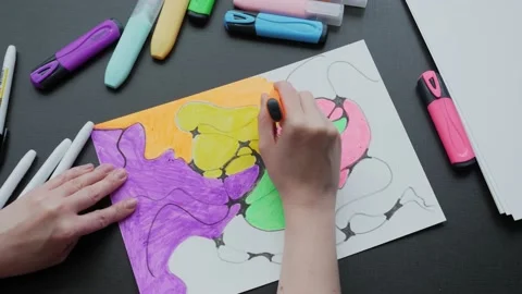 Neurographics close-up top view. a female hand paints a drawing with black Stock Footage 193745162