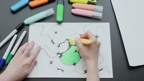 Neurographics close-up top view. a female hand paints a drawing with black Stock Footage 194479901