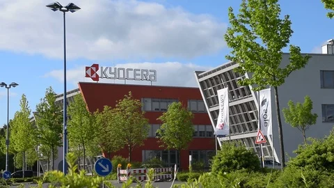 Neuss Germany May 12th 2018: Kyocera logo sign at their branch building Stock Footage 107893222