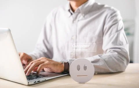 Neutral customer satisfaction feedback icon represents survey, man typing o.. Stock Photos