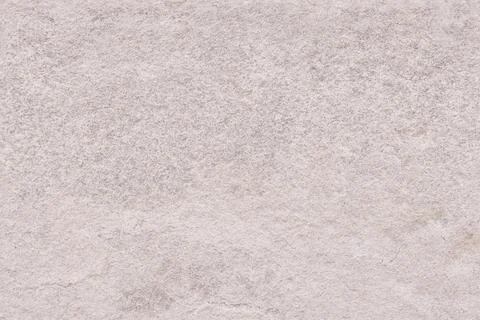 Neutral grey stone seamless repeating texture or background Stock Photos