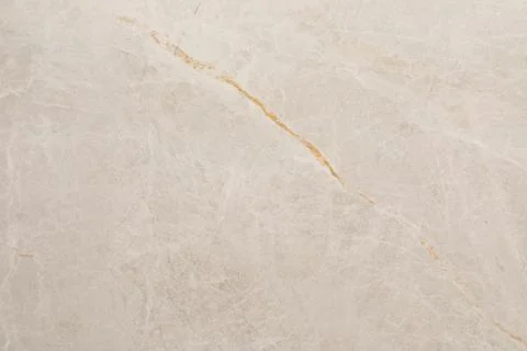 Neutral marble surface with subtle vein pattern and warm undertones for elegant Stockfoto's