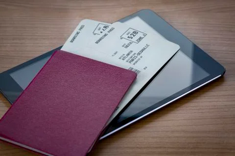 Neutral Passport with Tickets on Tablet Stock Photos