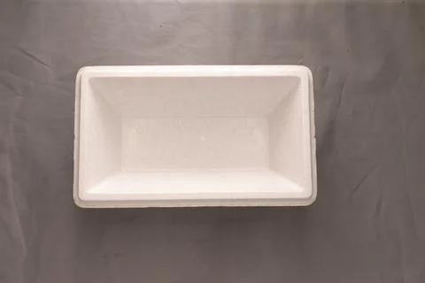 Neutral plastic container on a white and gray background top-down view for a 3d. Stock Photos