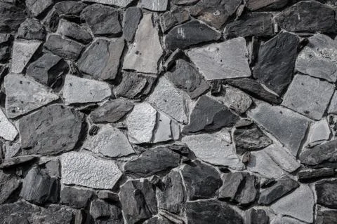 Neutral rock pattern wall as backdrop Stock Photos