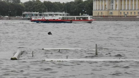 Neva River with passing excursion boats on a rainy autumn day. Stock Footage 340878517