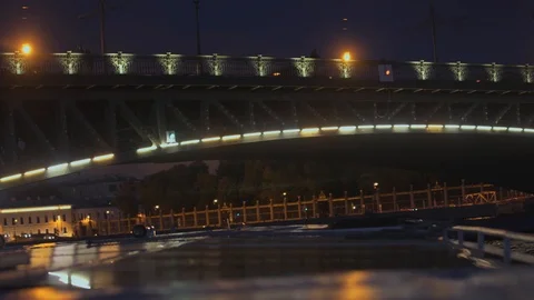 A Neva river surrounded by buildings of St. Petersburg at night Stock Footage 120133697