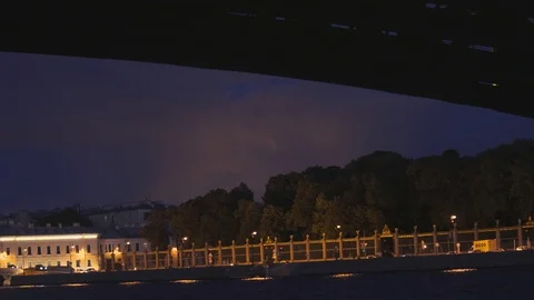 A Neva river surrounded by buildings of St. Petersburg at night Stock Footage 120133875