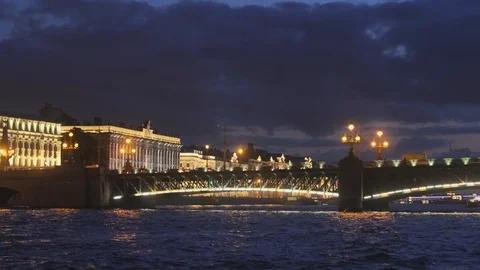 A Neva river surrounded by buildings of St. Petersburg at night Stock Footage 120134744