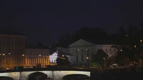 A Neva river surrounded by buildings of St. Petersburg at night Video stock 120136662