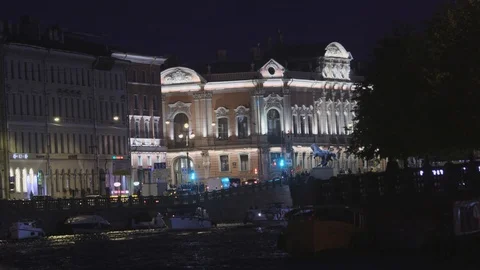 A Neva river surrounded by buildings of St. Petersburg at night Stock Footage 120152602