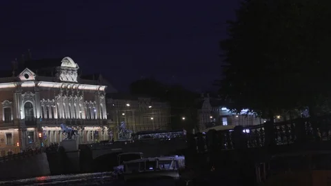 A Neva river surrounded by buildings of St. Petersburg at night Stock Footage 120152935