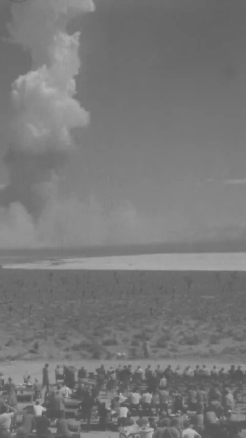 NEVADA - 1952 - A mushroom cloud towers over Nevada's nuclear proving grounds. Stock Footage 340292941