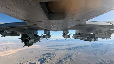 NEVADA - 4.2.2024 - Joint direct attack munitions are dropped by a USAF bomber Stock Footage 301298772