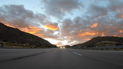 Nevada I-15 Rear View Driving Desert Sunset Stock Footage