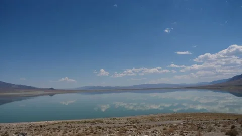 Nevada Walker Lake cloud water reflection panorama Stock Footage 208579438