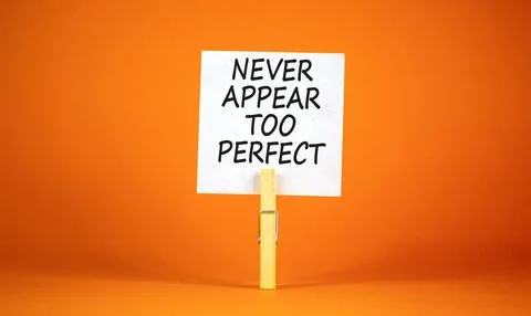 Never appear too perfect symbol. Concept words Never appear too perfect on be Stock Photos